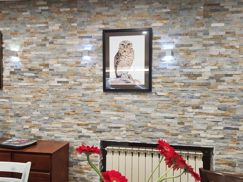 house renovation Mildura 3 — stone feature wall with wall lighting