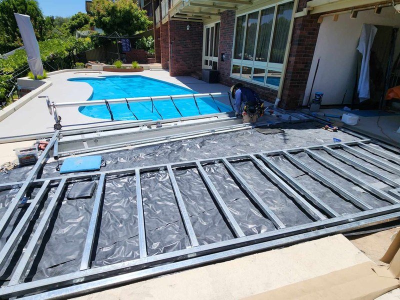 pool deck construction Mildura — steel frame composite deck beside pool
